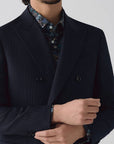 SUIT IN A WOOL BLEND NAVY STRIPES