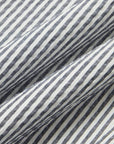 SUIT IN STRETCH FABRIC BUBBLE GAUZE WITH WHITE AND BLUE STRIPES